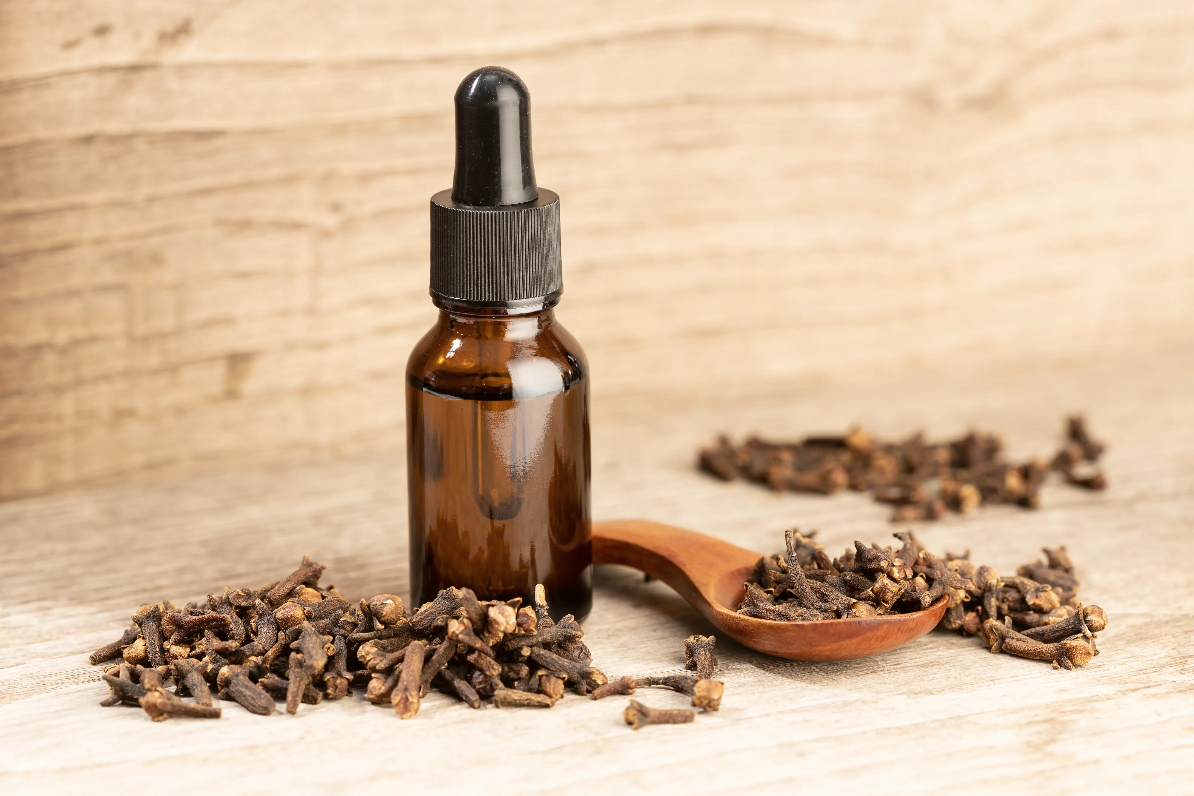 clove essential oil still life used help with reducing nerve pain