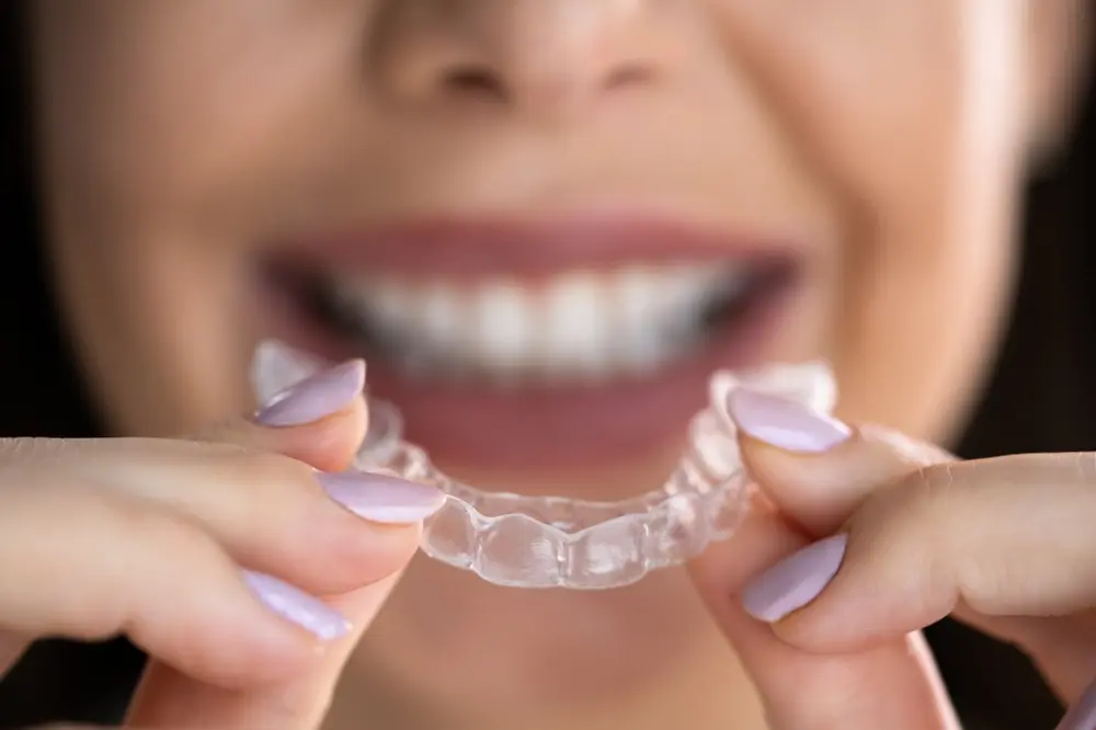 Night guard used to help with receding gum on one tooth